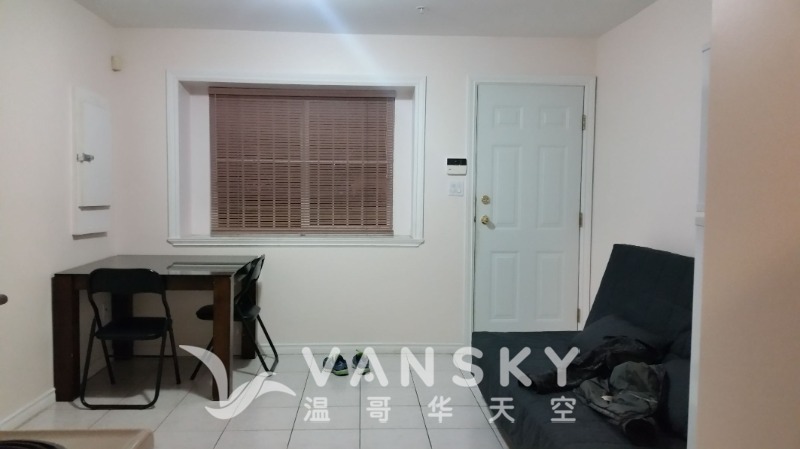 250301231331_Inside Living room with widow facing back yard.jpg